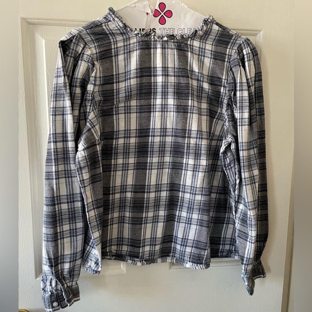 White blue black and gray flannel top
